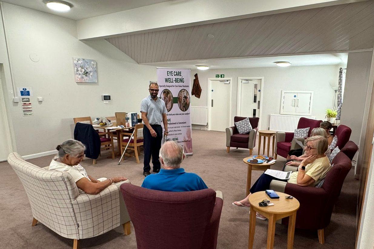 Older adults listening during a First Care Optical community vision talk